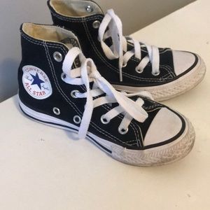 Black and white high top converse sneakers